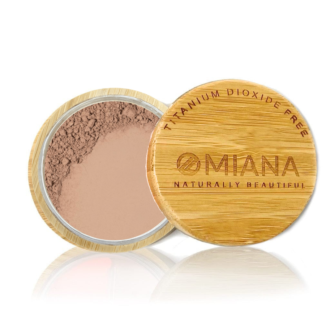 Omiana vegan Loose Powder Mineral Makeup Titanium Dioxide-Free Mica-Free in an Open bamboo container with a bamboo lid on a white background