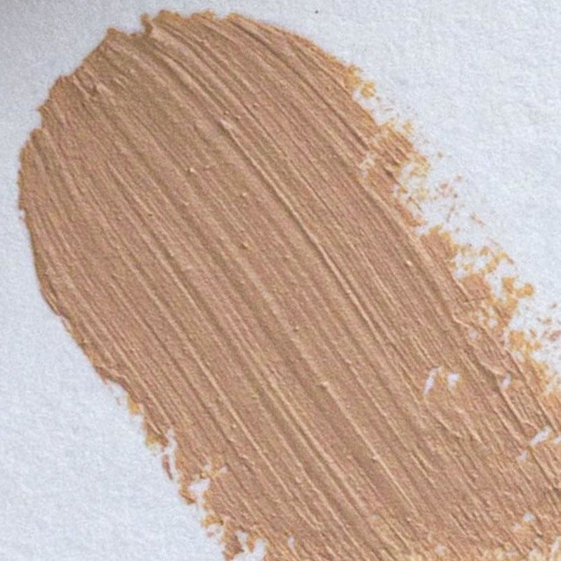 Tan blemish and under-eye concealer made with mica-free and all-natural ingredients